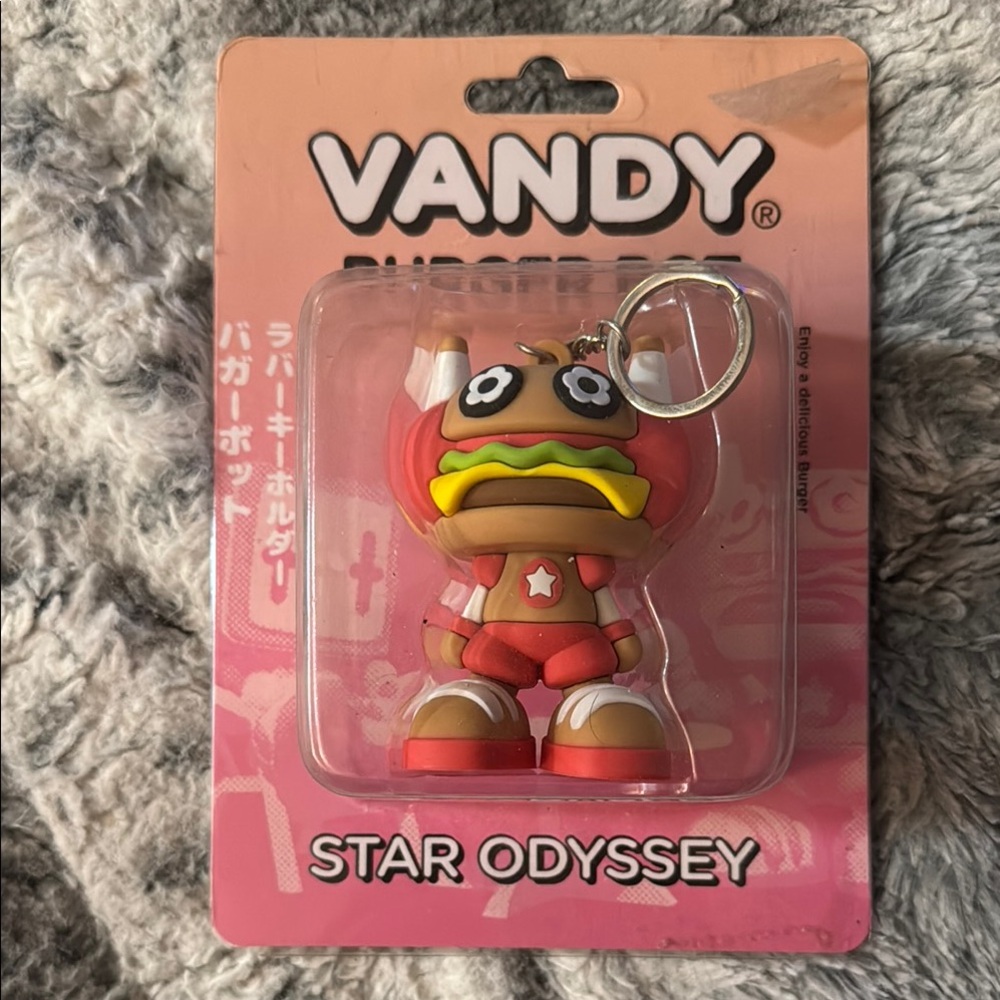 Men’s or Women’s Vandy The Pink Burger Star Odyssey keychain. Super rare & New.